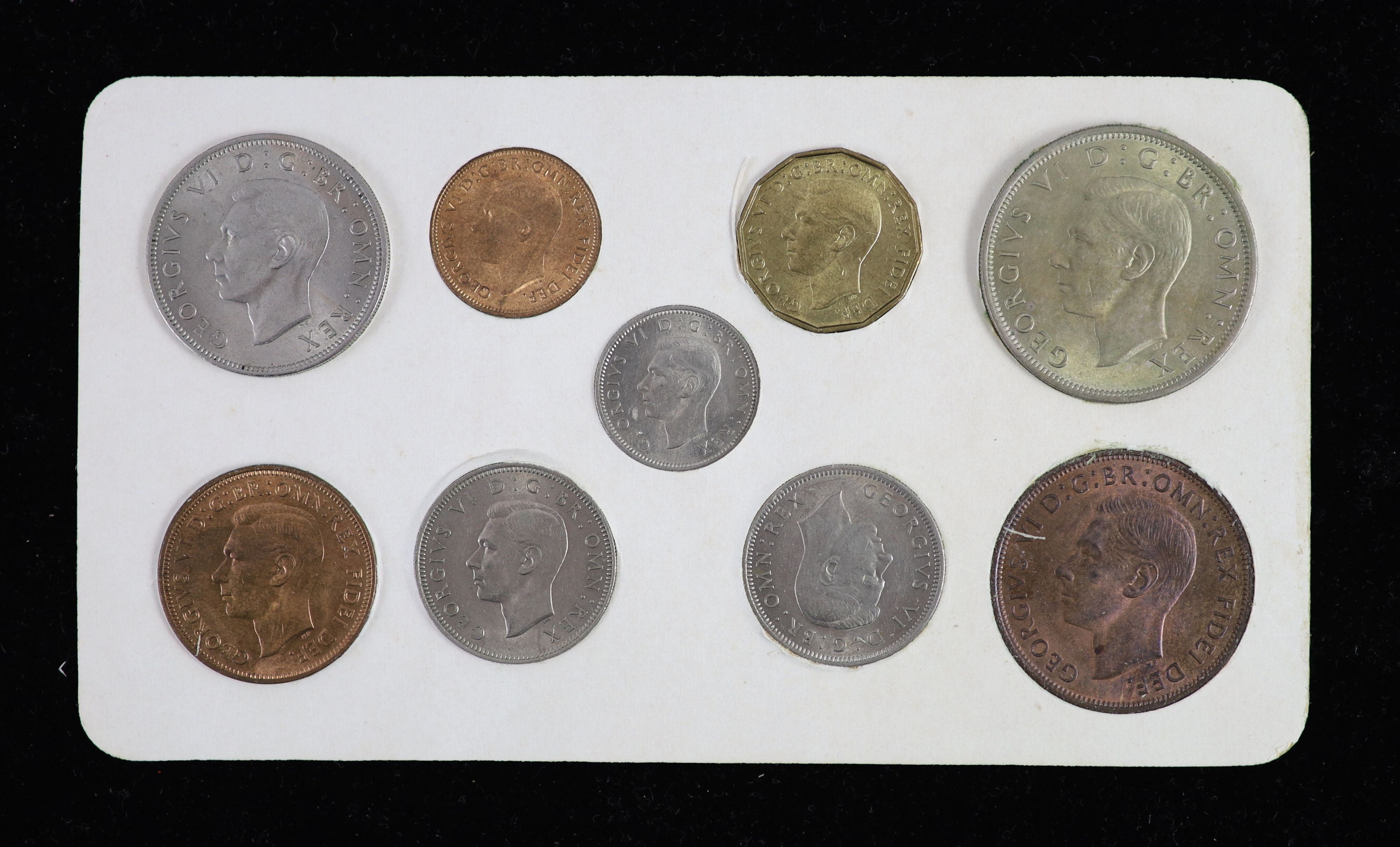 George VI nine coin specimen set for 1949, second issue, including the rare 1949 brass threepence (S4113), EF, rare in this grade or higher